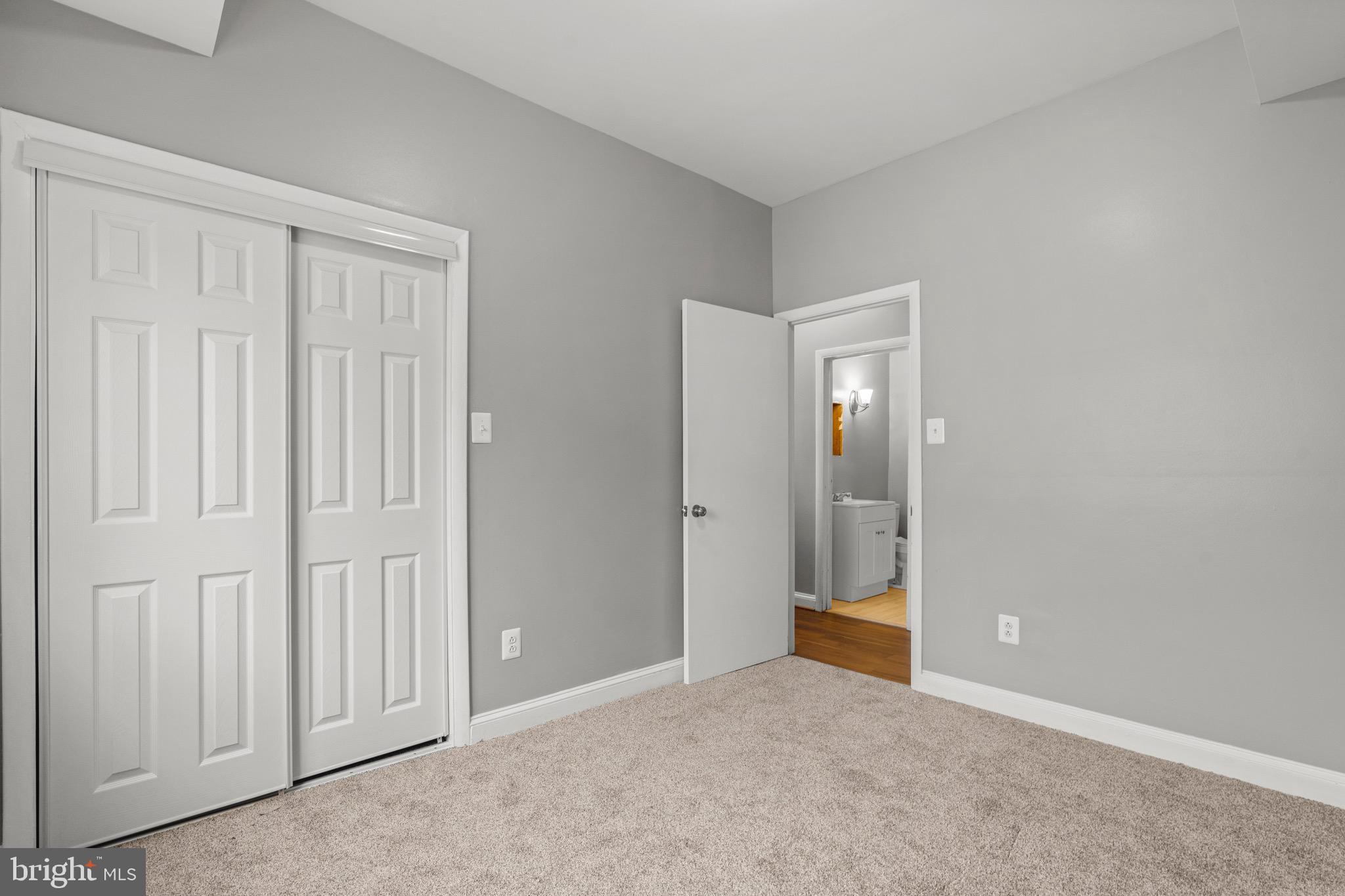 2834 R Street Southeast, Unit 5 Washington, DC 20020 - Photo 21 of 30 an empty room with windows