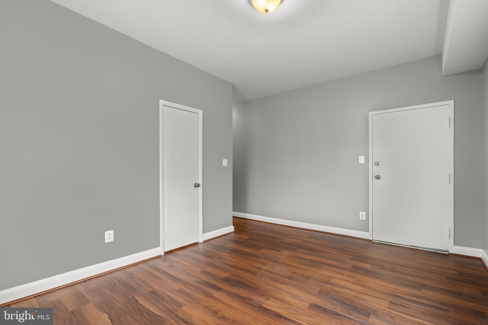 2834 R Street Southeast, Unit 5 Washington, DC 20020 - Photo 25 of 30 a view of an empty room with wooden floor