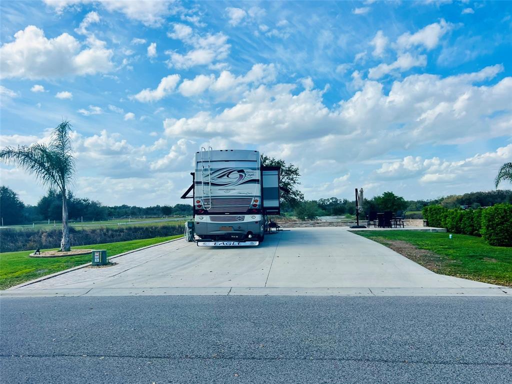 4844 Southeast 92nd Boulevard Webster, FL 33597 - Photo 1 of 1 a park view with a bench