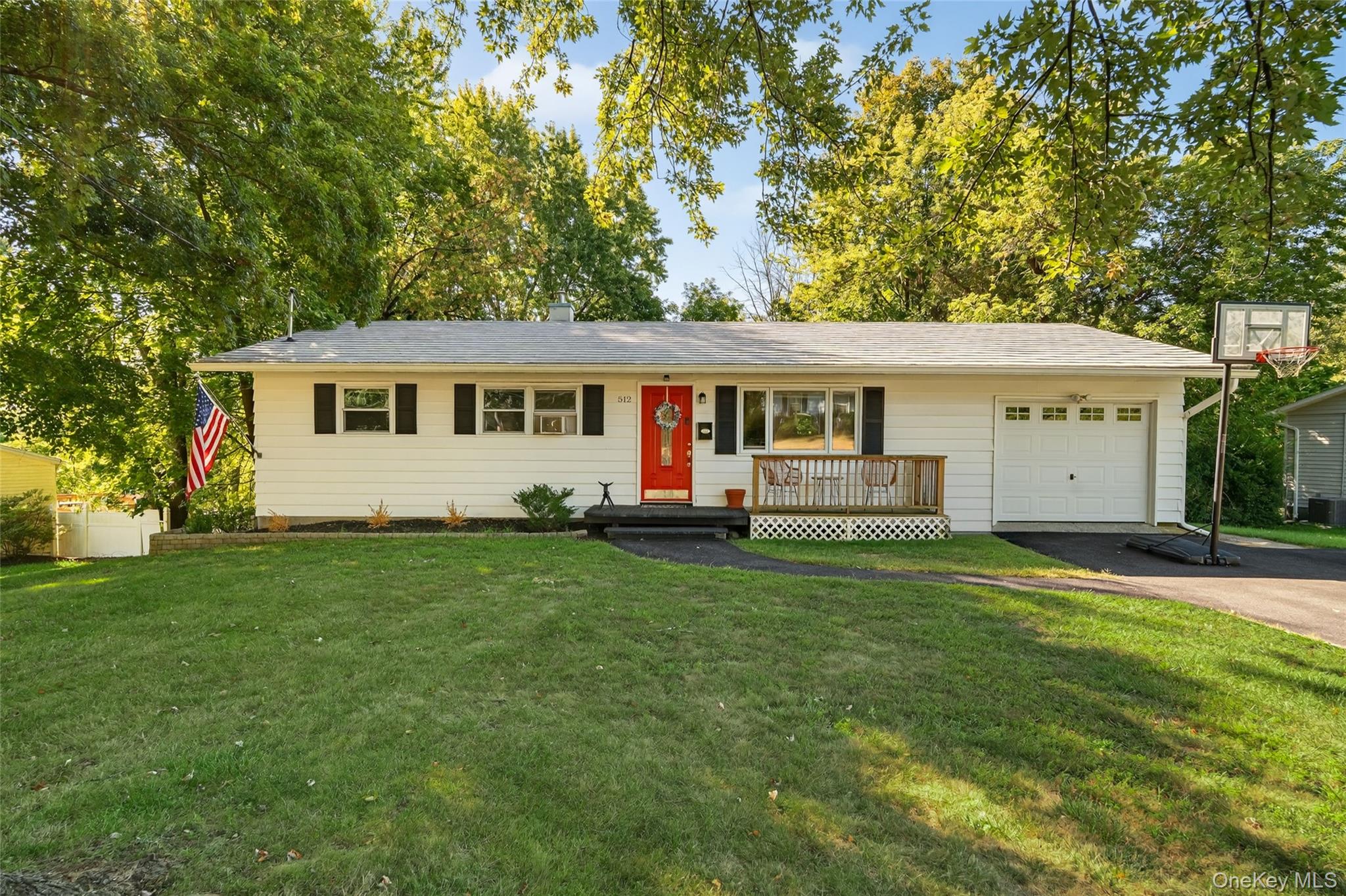 512 High Street Monroe, NY 10950 - Photo 1 of 1 a front view of a house with a garden