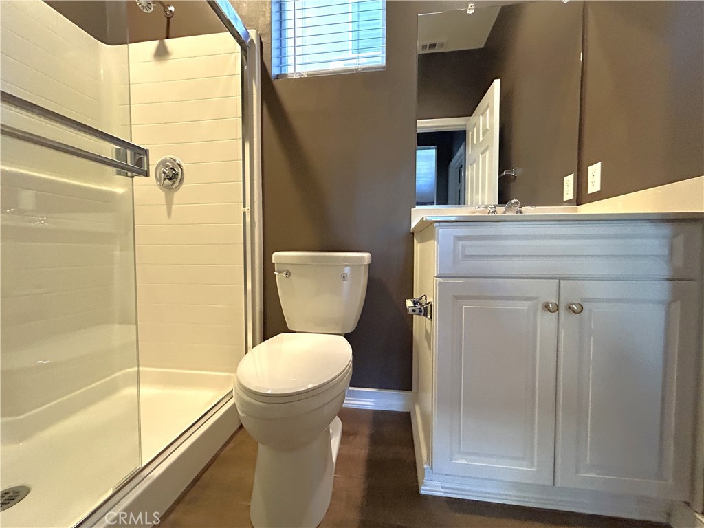 16051 Nature Chino, CA 91708 - Photo 11 of 41 a bathroom with a toilet and a shower