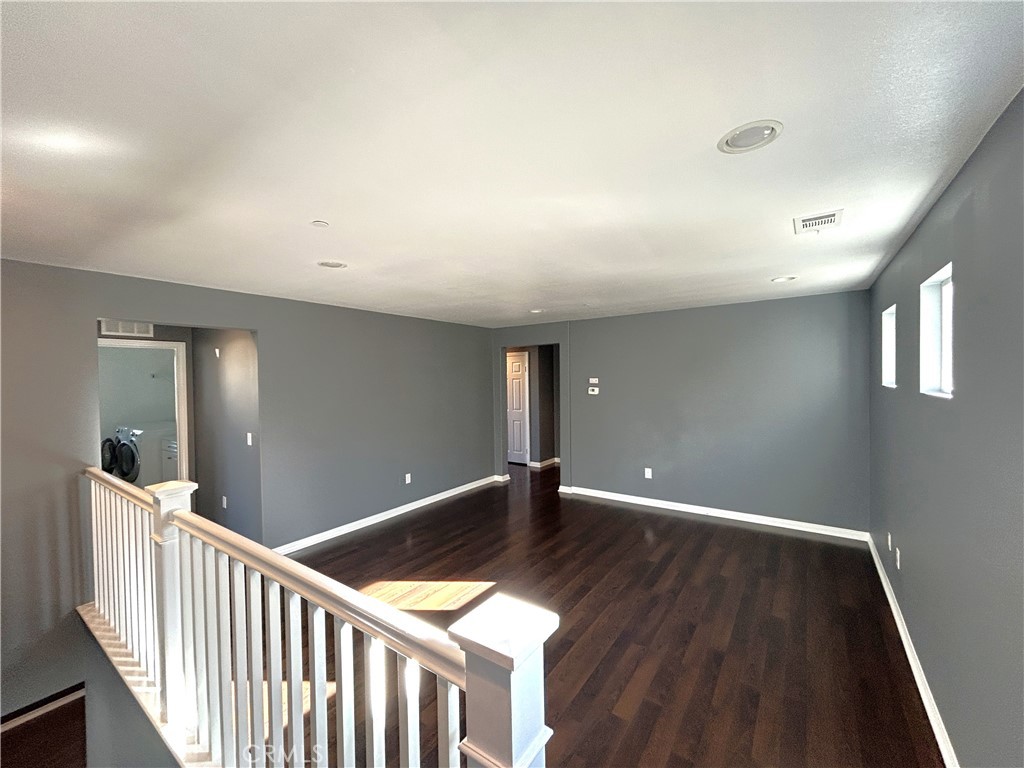 16051 Nature Chino, CA 91708 - Photo 12 of 41 a view of a hallway with wooden floor