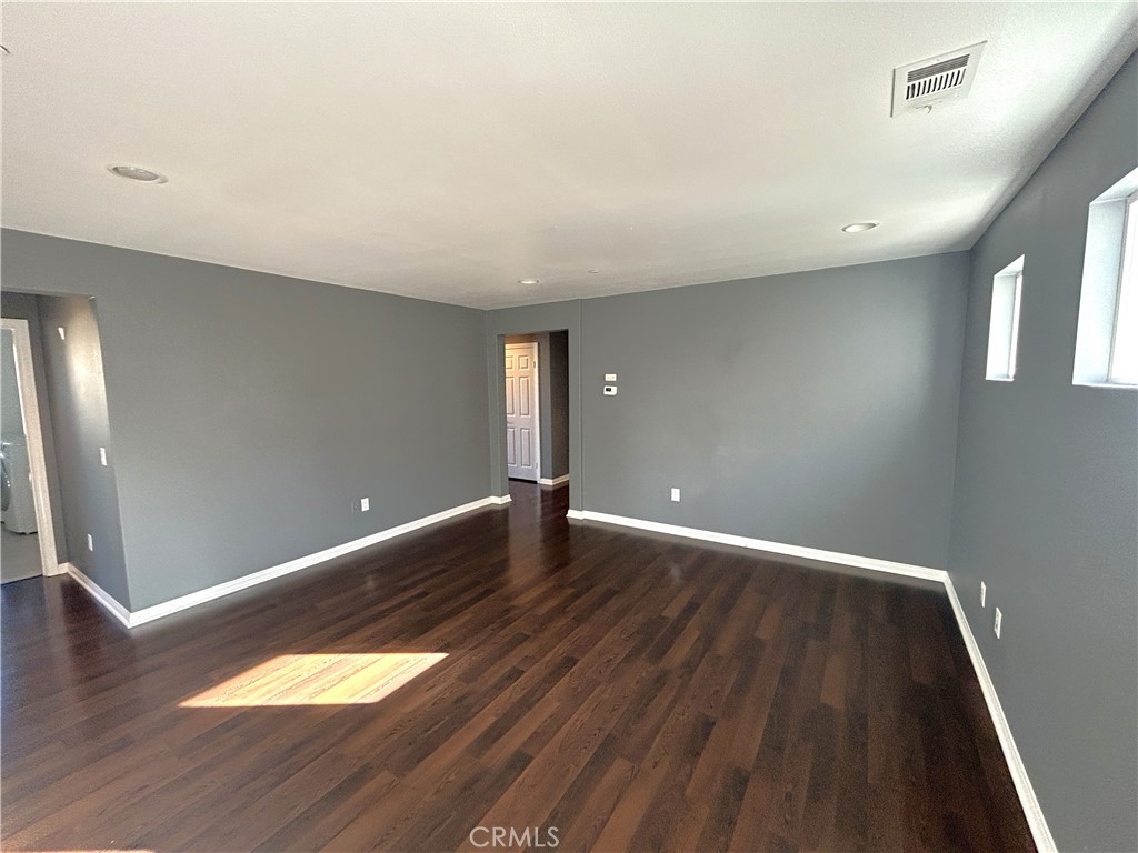 16051 Nature Chino, CA 91708 - Photo 13 of 41 a view of an empty room with wooden floor