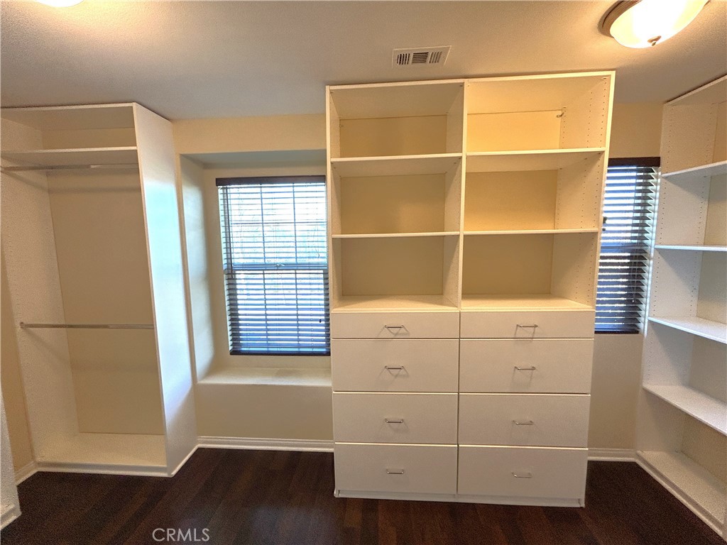 16051 Nature Chino, CA 91708 - Photo 19 of 41 a view of a room with wooden floor and white walls