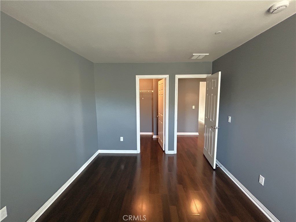 16051 Nature Chino, CA 91708 - Photo 23 of 41 a view of an empty room with wooden floor