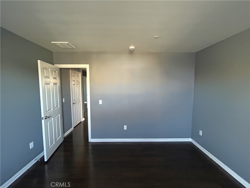 16051 Nature Chino, CA 91708 - Photo 29 of 41 en empty room with wooden floor and entrance