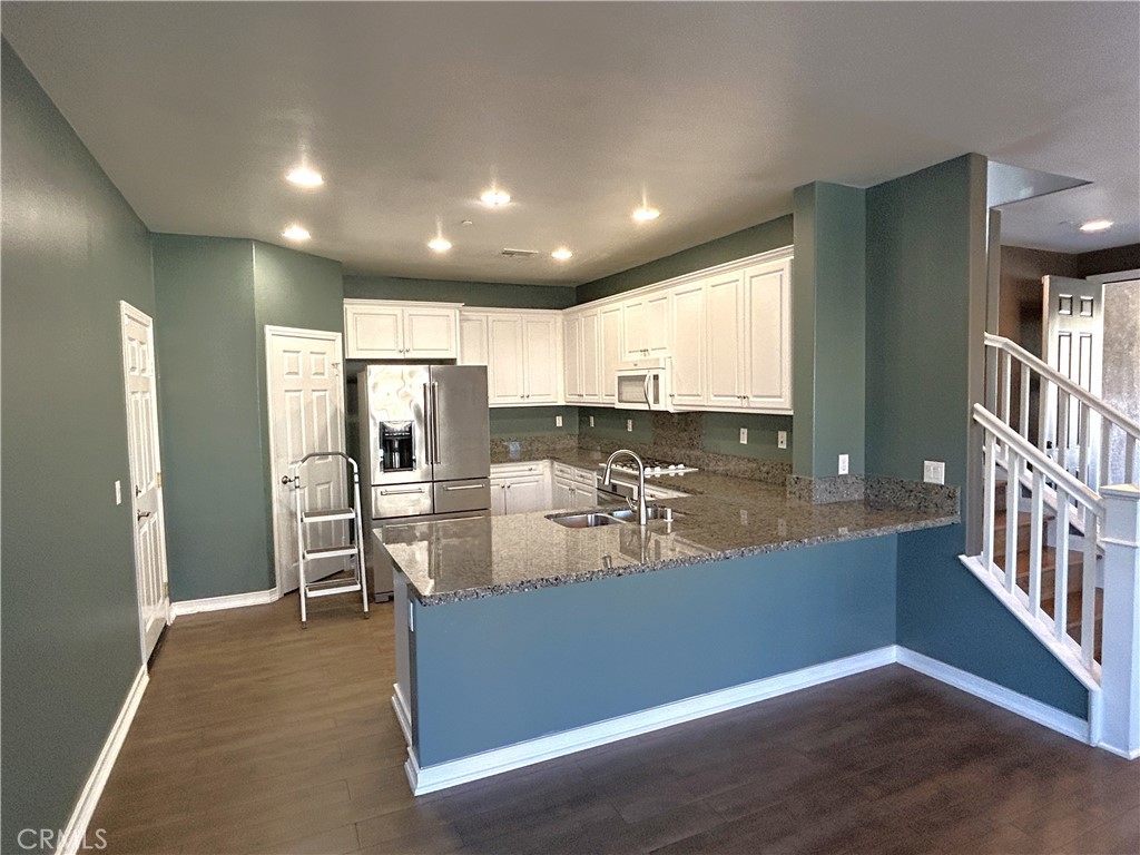16051 Nature Chino, CA 91708 - Photo 3 of 41 a view of a kitchen with stainless steel appliances granite countertop a refrigerator and a sink