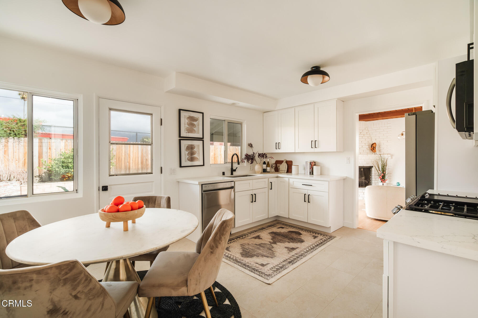 43 East Pamela Road Arcadia, CA 91006 - Photo 12 of 22 a white kitchen with a stove a white table and chairs