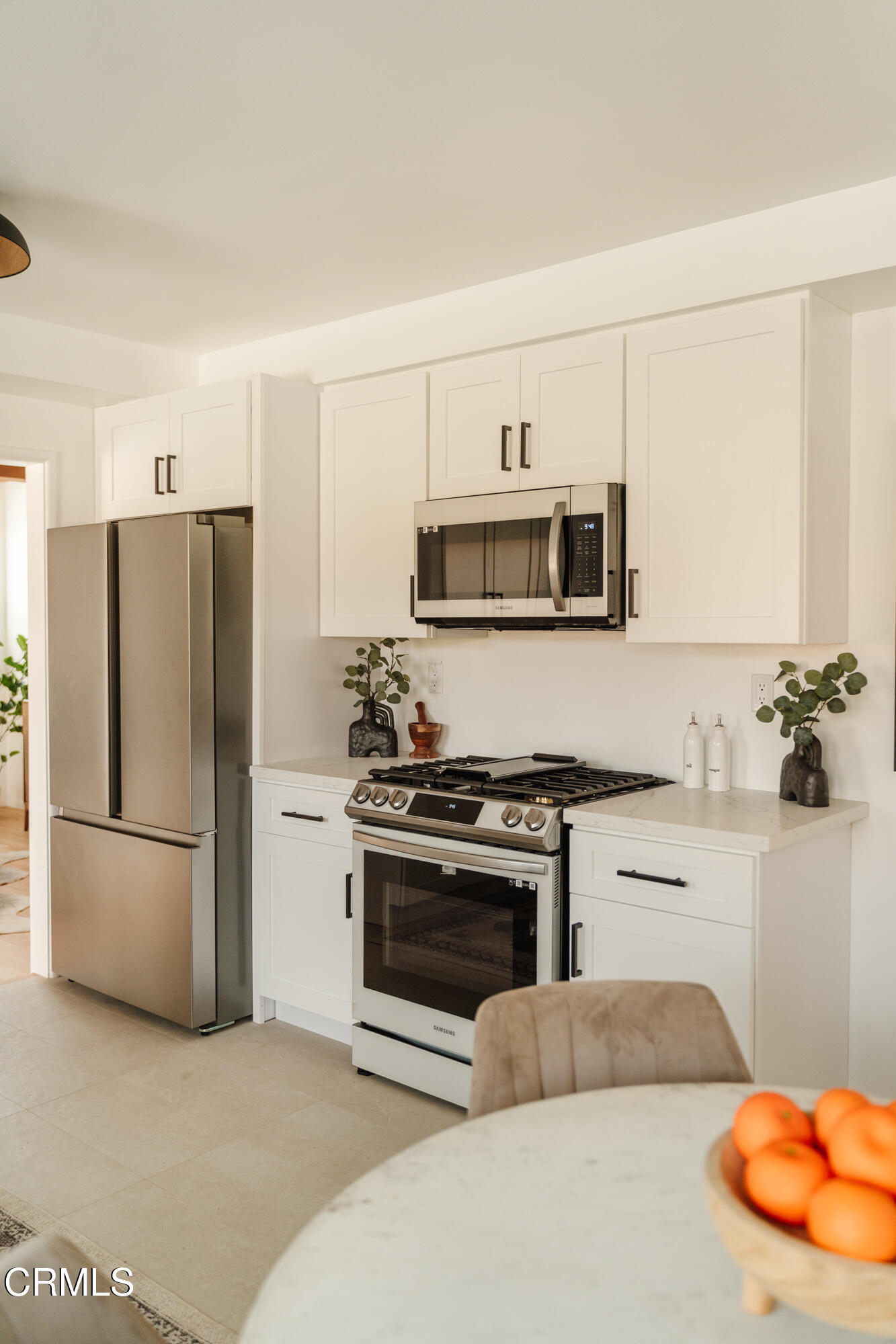43 East Pamela Road Arcadia, CA 91006 - Photo 10 of 22 a kitchen with stainless steel appliances granite countertop a refrigerator stove and microwave