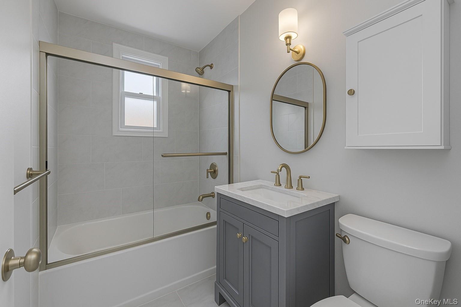 32 Cathedral Avenue, Unit 6C Hempstead, NY 11550 - Photo 11 of 14 a bathroom with a sink toilet and shower