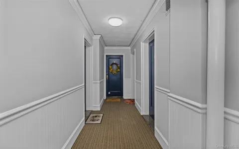a view of hallway with stairs