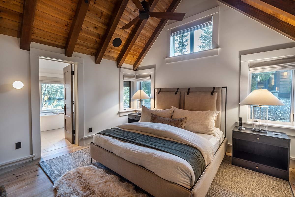 8262 Valhalla Drive Truckee, CA 96161 - Photo 15 of 21 a bedroom with a bed and a lamp