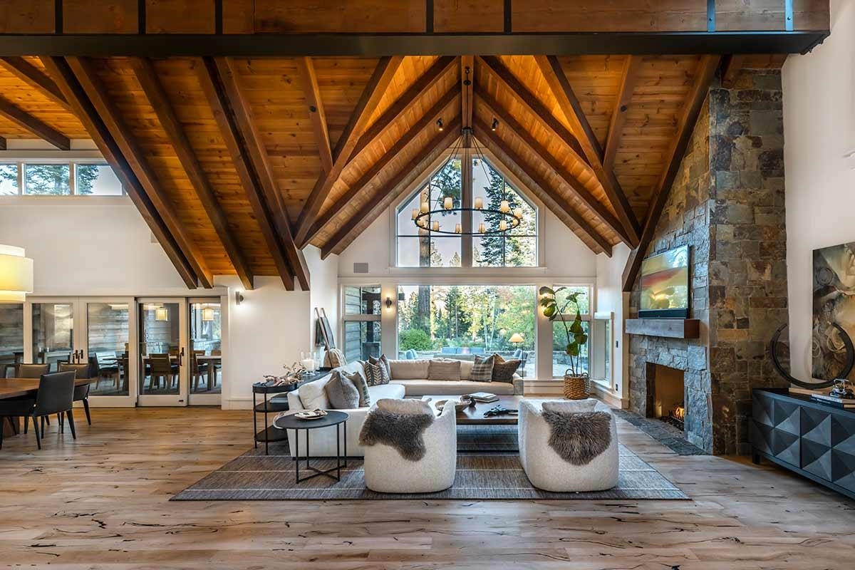 8262 Valhalla Drive Truckee, CA 96161 - Photo 6 of 21 a view of a dining room with furniture a fireplace and wooden floor