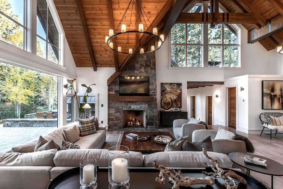 8262 Valhalla Drive Truckee, CA 96161 - Photo 7 of 21 a living room with furniture a fireplace and a large window