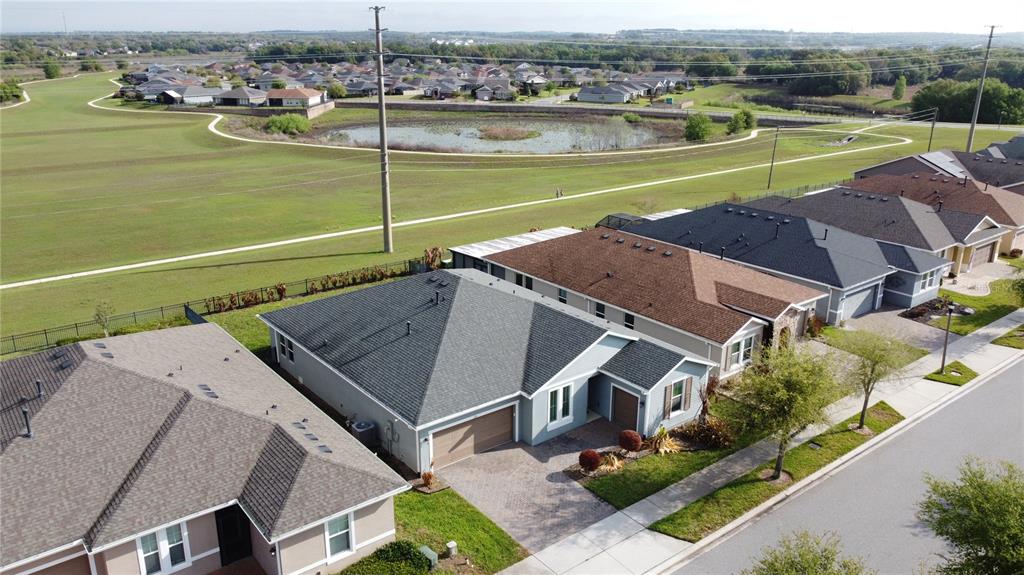 178 Silver Maple Road Groveland, FL 34736 - Photo 47 of 72 an aerial view of a house with a outdoor space