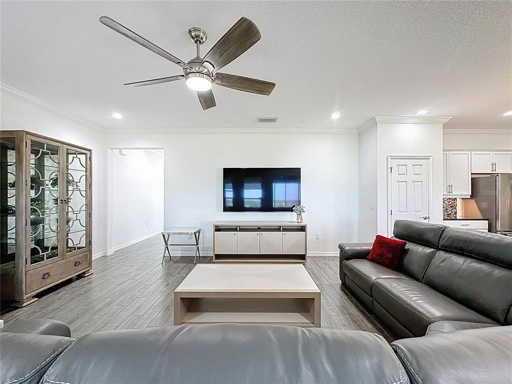 178 Silver Maple Road Groveland, FL 34736 - Photo 5 of 72 a living room with furniture and a window