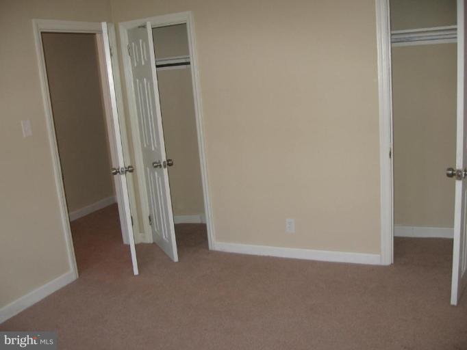 2209 Monticello Road Baltimore, MD 21216 - Photo 11 of 30 a view of room with stairs
