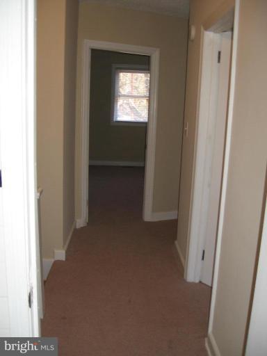 2209 Monticello Road Baltimore, MD 21216 - Photo 12 of 30 a view of a hallway