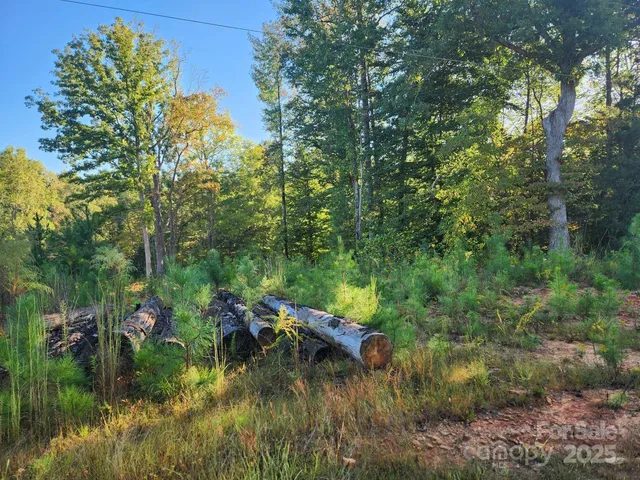 a view of a lake view with houses in back