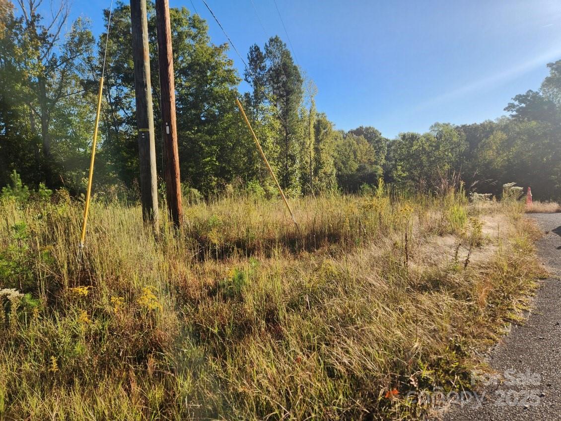 0 Cross Creek Estates Road Lancaster, SC 29720 - Photo 9 of 11 a view of a lake with a house in the background