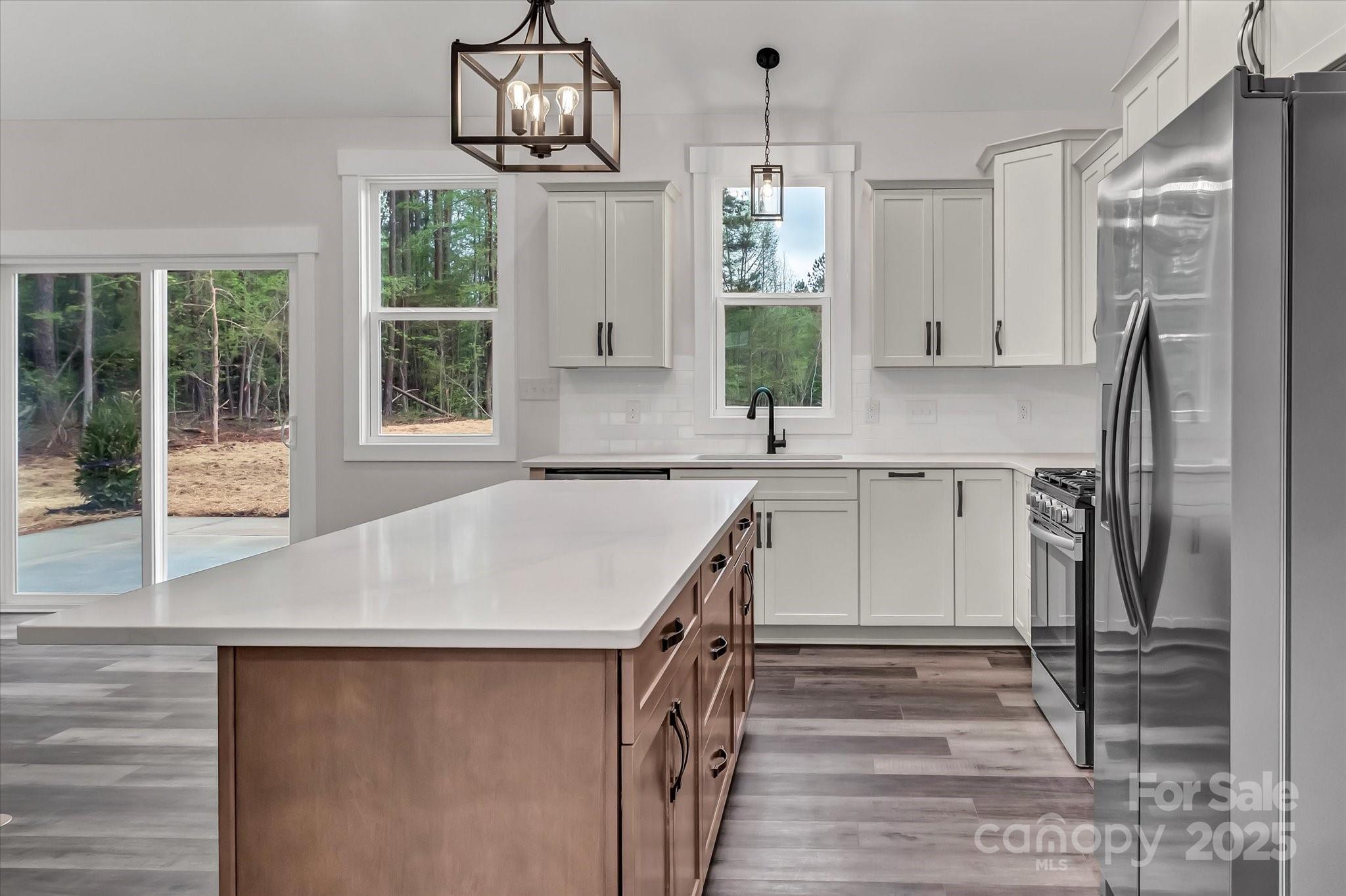 2147 Dunlap Roddey Road Rock Hill, SC 29730 - Photo 14 of 27 a kitchen with a sink a refrigerator and window