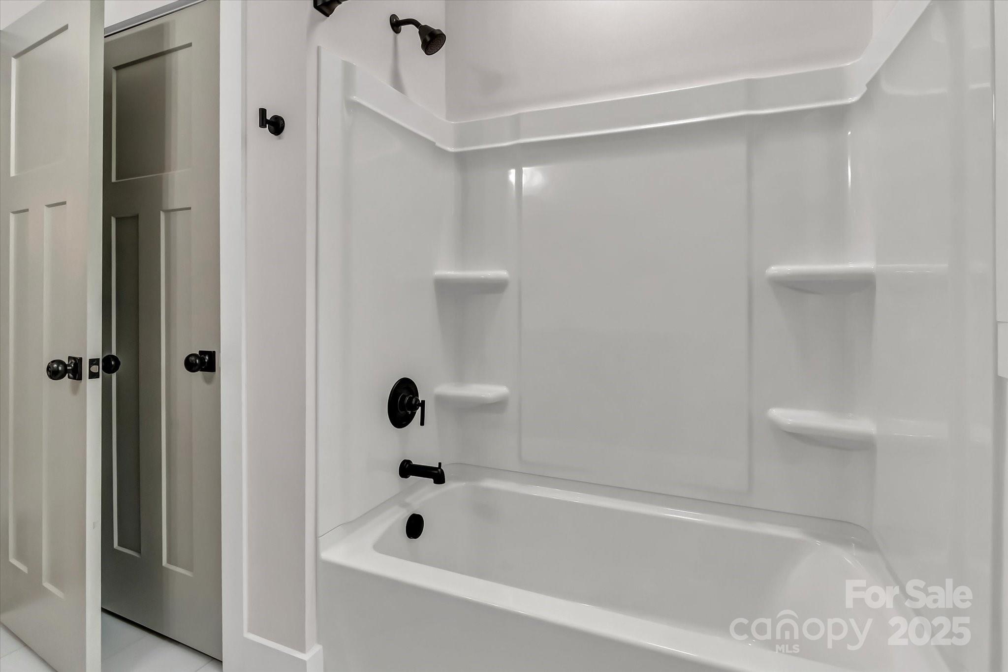 2147 Dunlap Roddey Road Rock Hill, SC 29730 - Photo 23 of 27 a bathroom with a bathtub