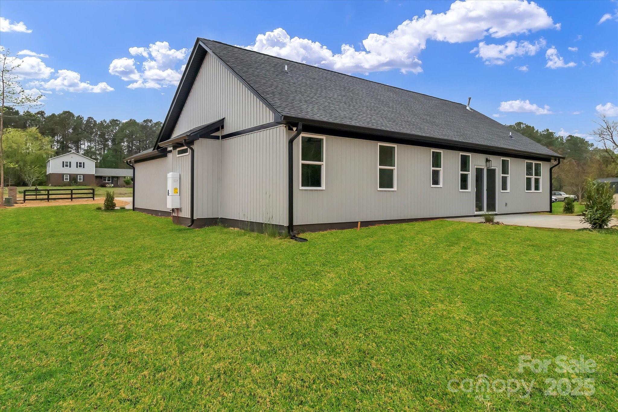 2147 Dunlap Roddey Road Rock Hill, SC 29730 - Photo 5 of 27 a front view of a house with garden