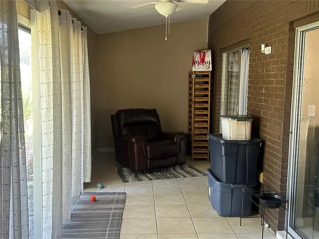 a view of entryway and hall with furniture