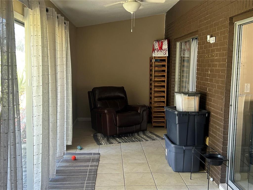 423 Greenfield Road Winter Haven, FL 33884 - Photo 11 of 14 a view of entryway and hall with furniture