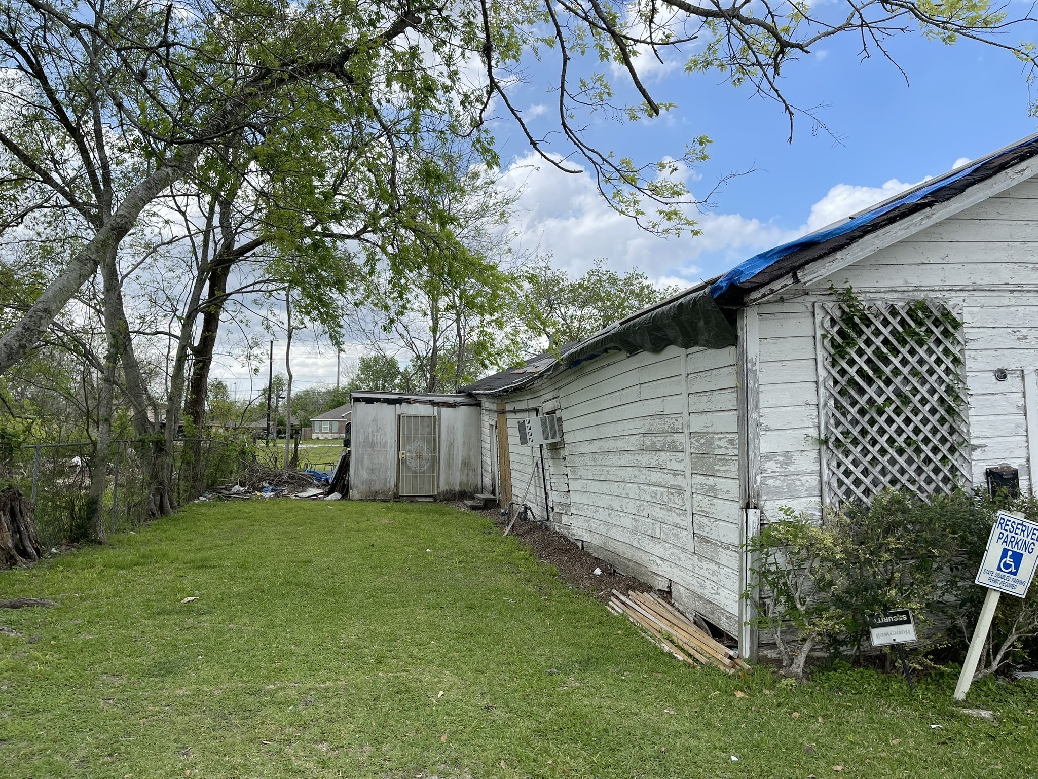 8536 Scott Street Houston, TX 77051 - Photo 3 of 10 a backyard of a house with lots of green space