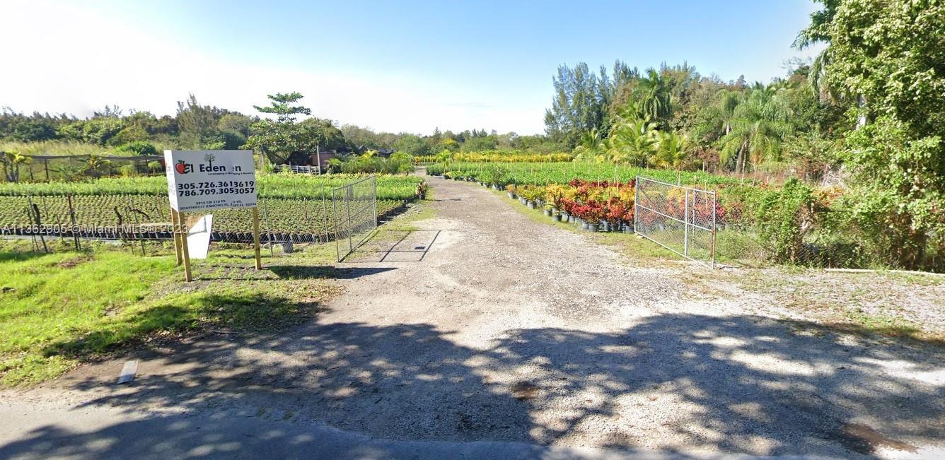 210 Sw Terrace Southwest Ranches, FL 33332 - Photo 2 of 2 a view of a park with large trees