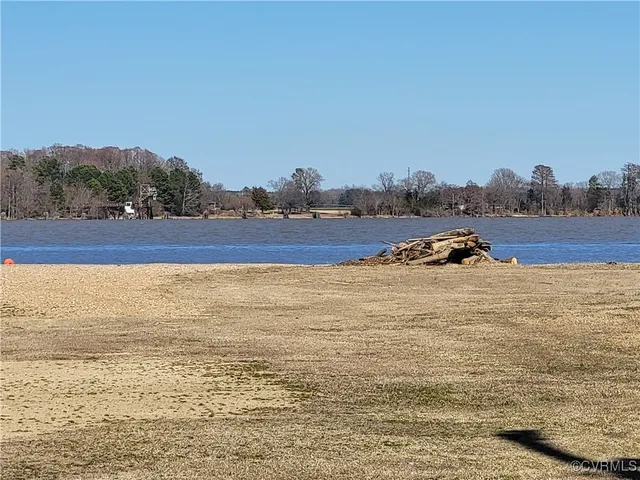 a view of a yard with an ocean view