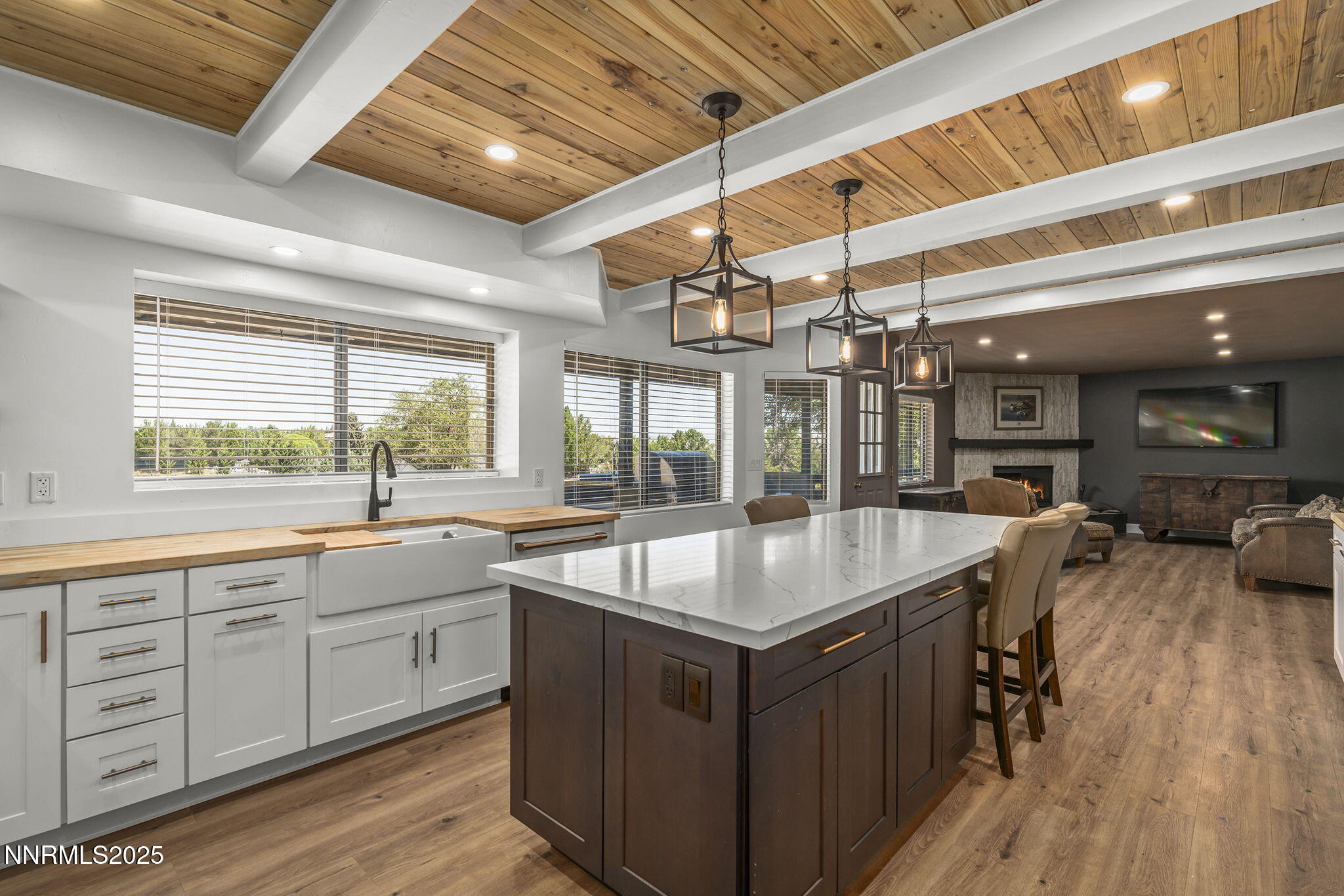 3485 Frost Lane Reno, NV 89511 - Photo 15 of 44 a kitchen with a sink a counter top space and a large window