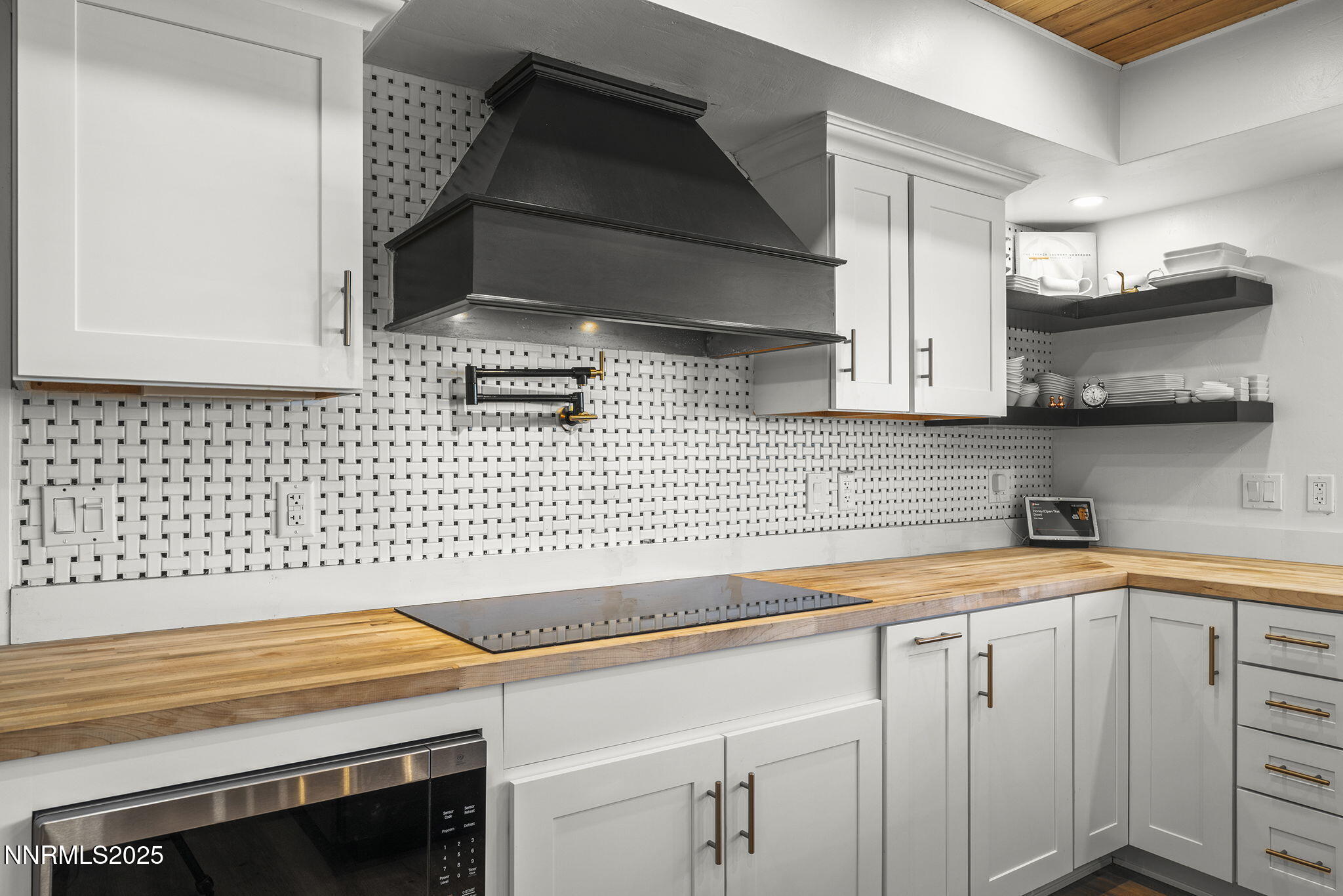 3485 Frost Lane Reno, NV 89511 - Photo 16 of 44 a kitchen with a sink and cabinets