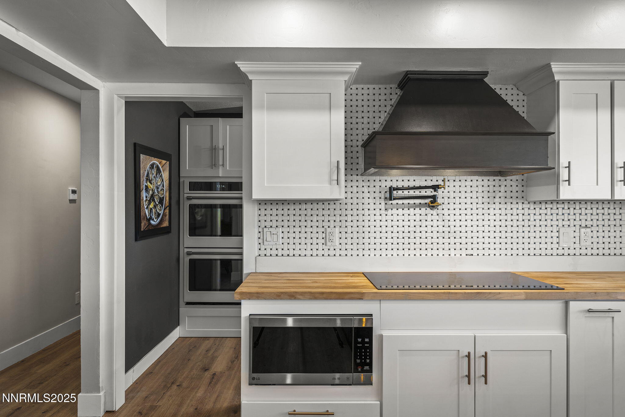 3485 Frost Lane Reno, NV 89511 - Photo 18 of 44 a kitchen with a sink and a stove top oven