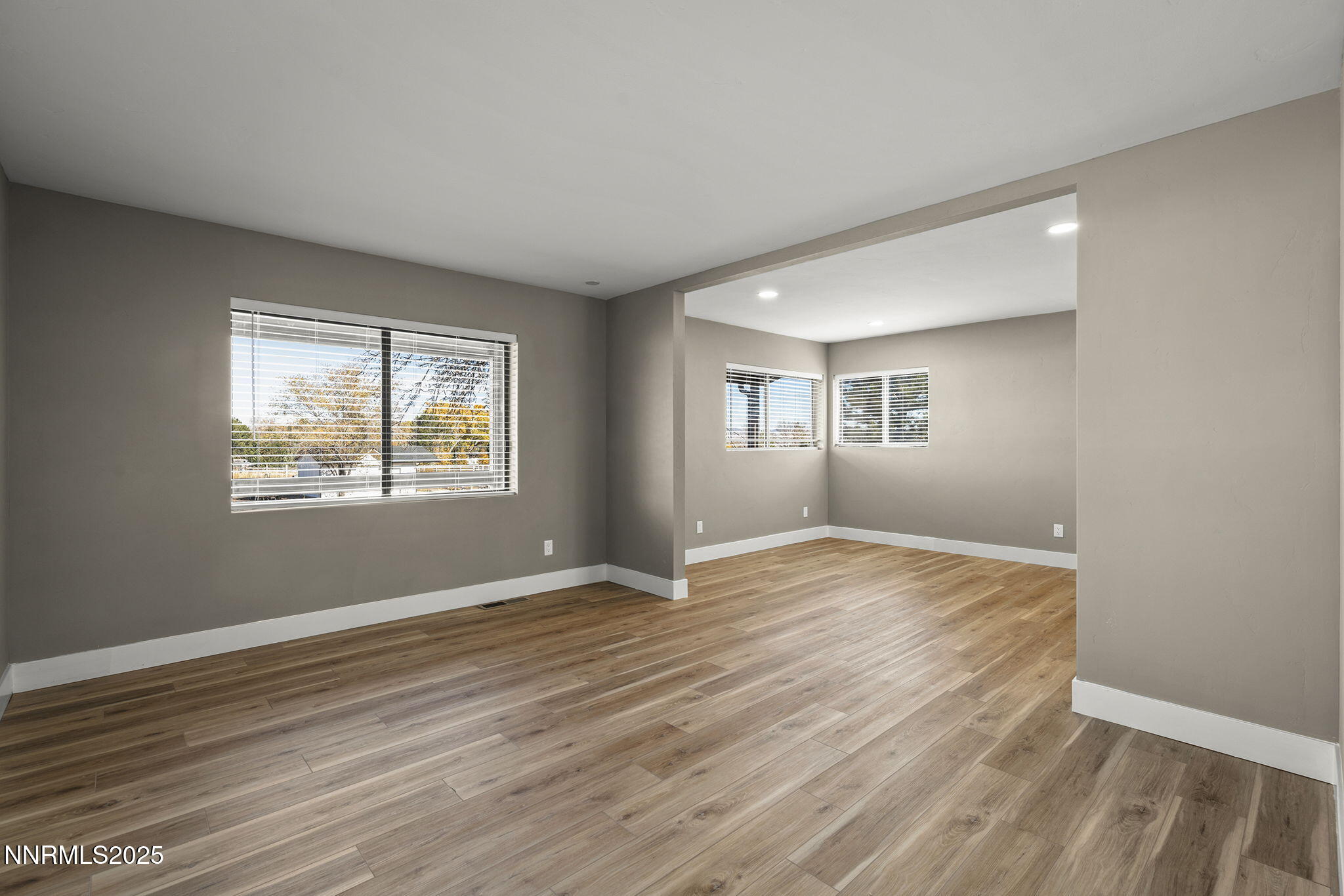 3485 Frost Lane Reno, NV 89511 - Photo 20 of 44 a view of empty room with wooden floor and fan