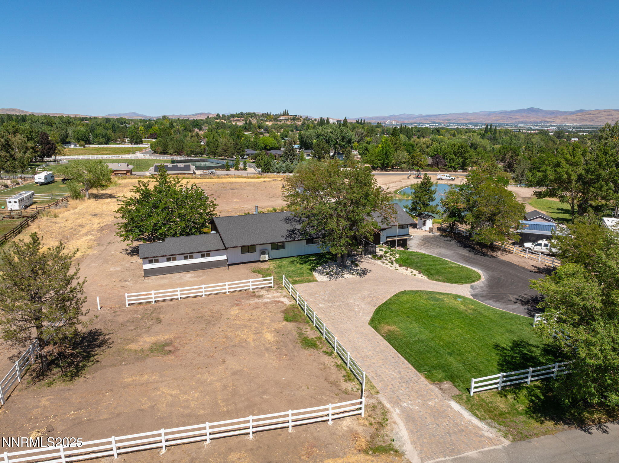 3485 Frost Lane Reno, NV 89511 - Photo 2 of 44 a view of a lake with a yard