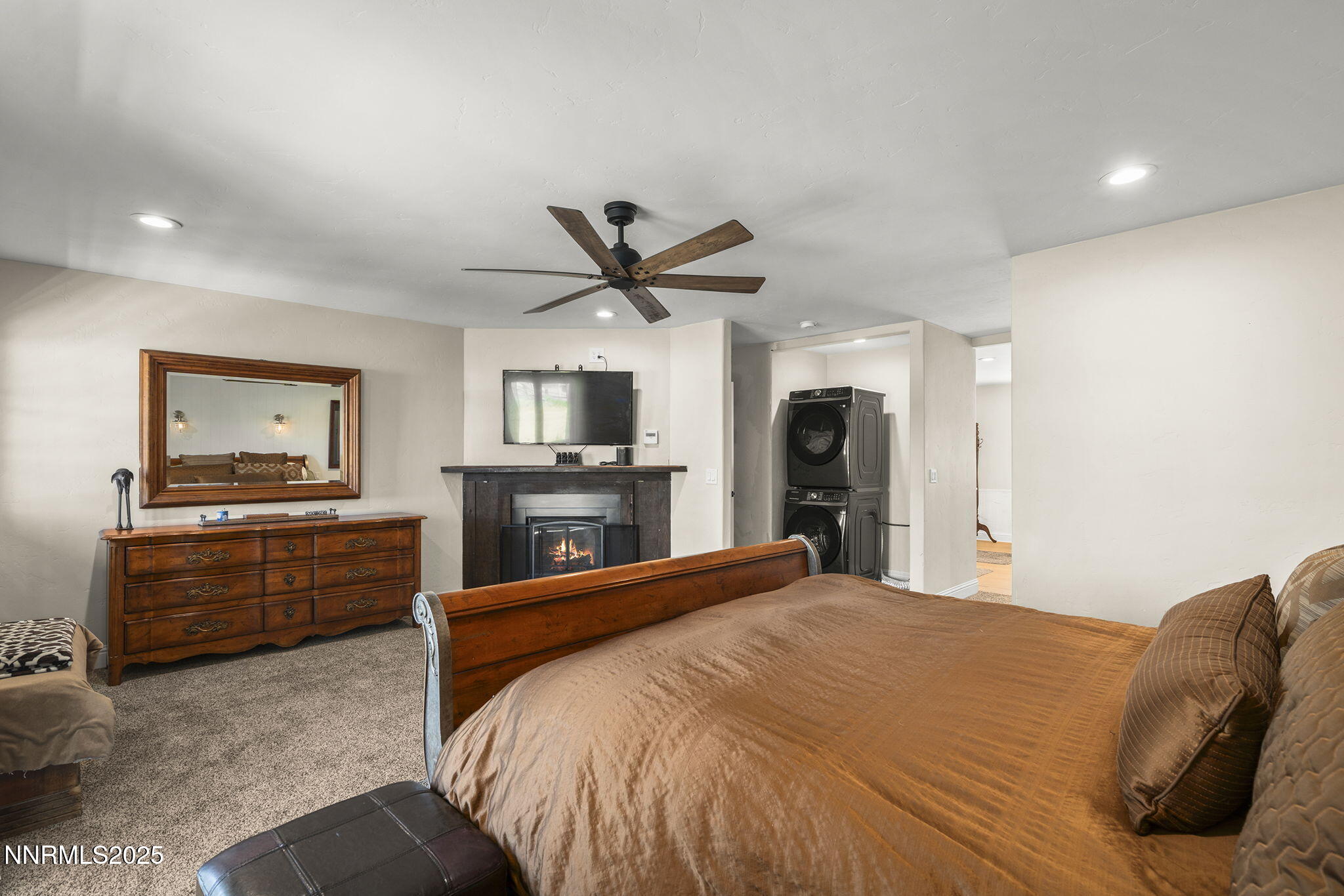 3485 Frost Lane Reno, NV 89511 - Photo 26 of 44 a bed room with a bed and a television