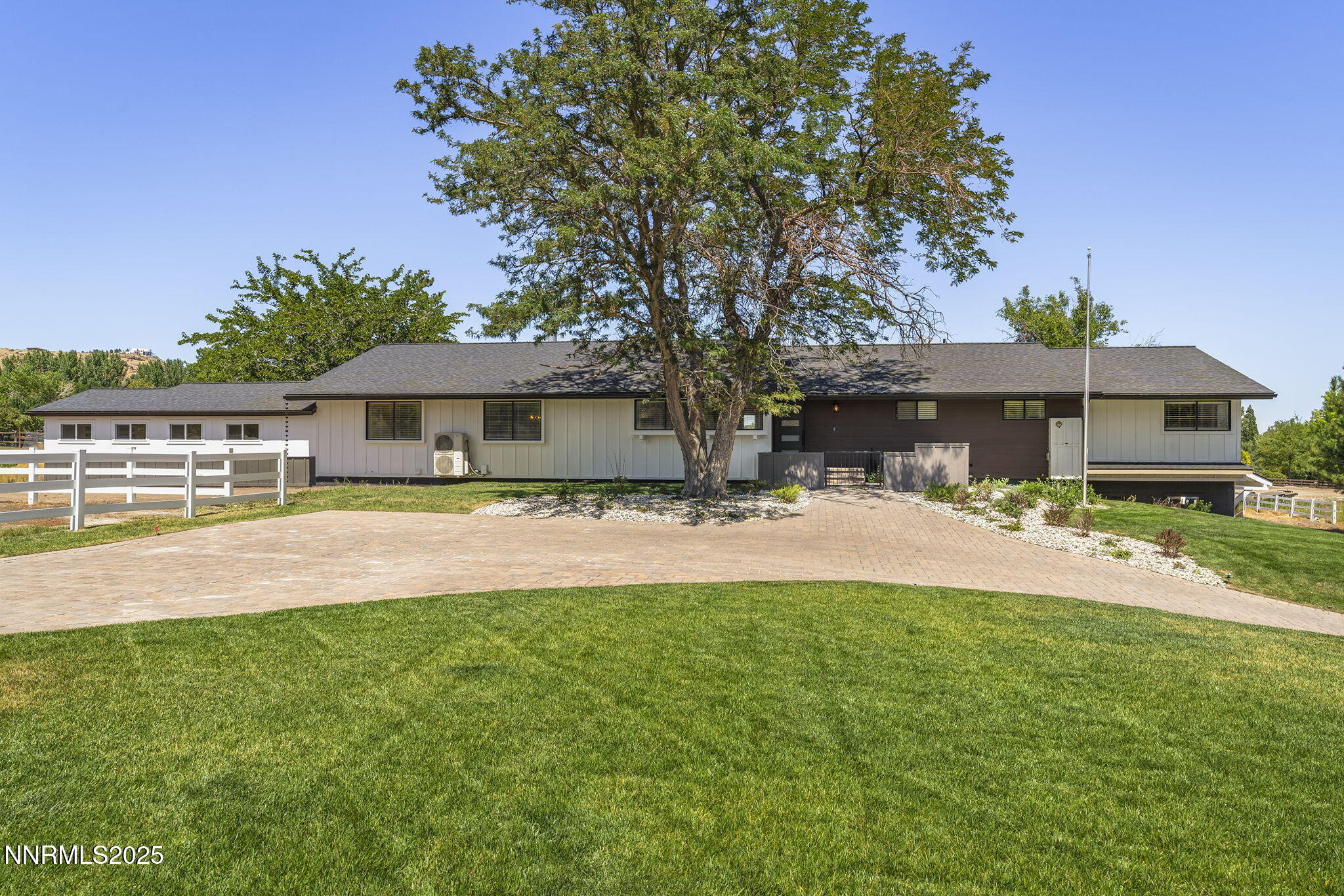 3485 Frost Lane Reno, NV 89511 - Photo 4 of 44 a front view of a house with swimming pool having outdoor seating