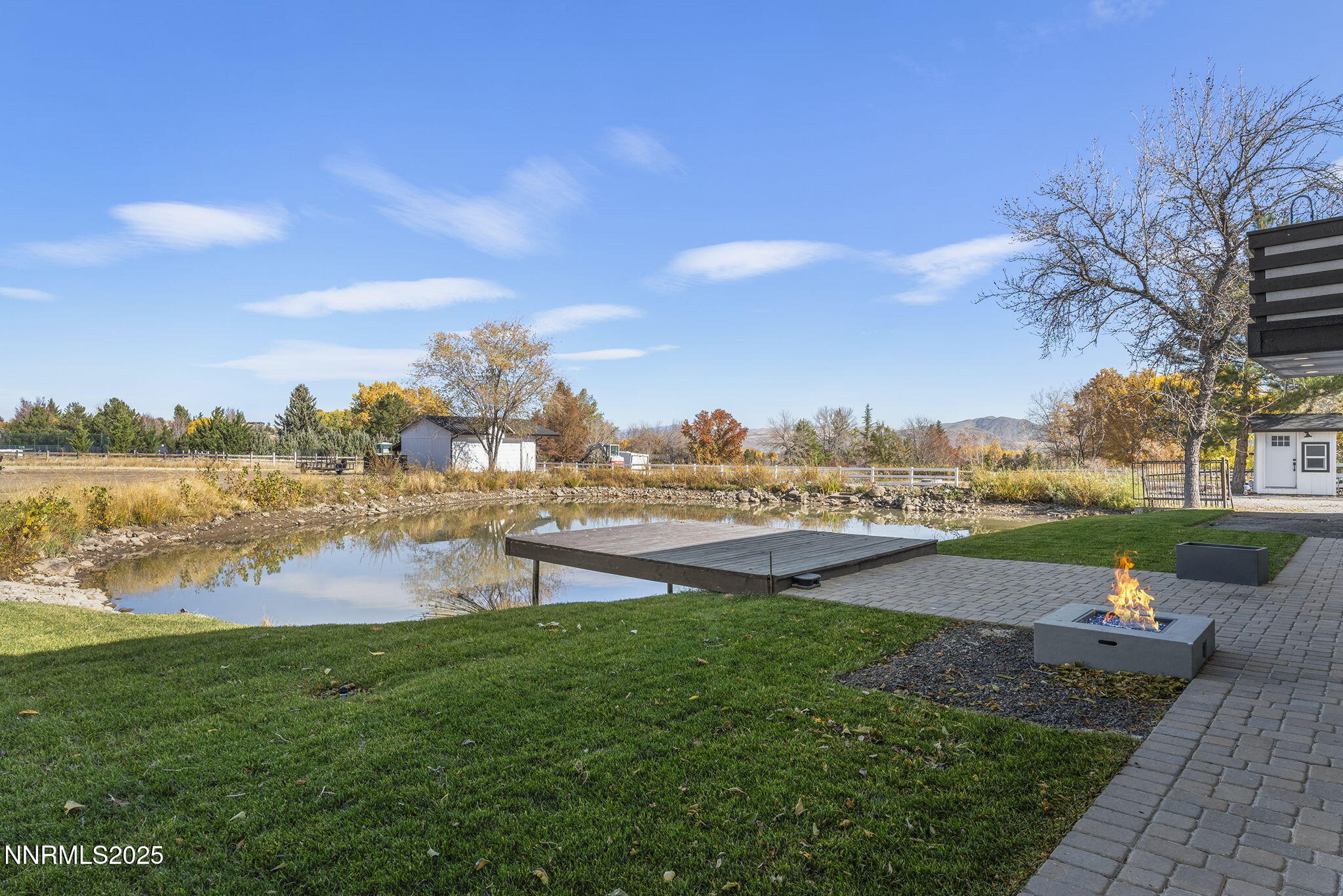 3485 Frost Lane Reno, NV 89511 - Photo 44 of 44 a view of a lake with houses in the back