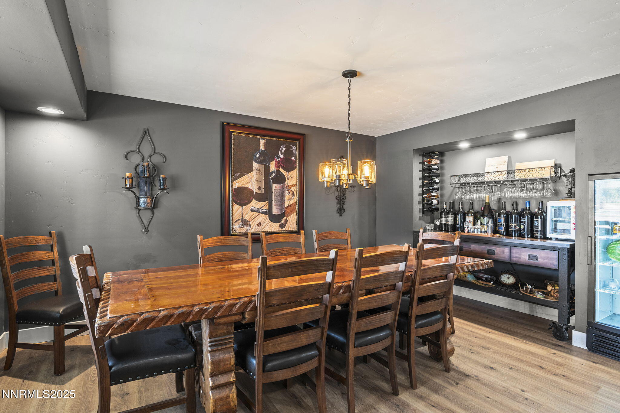 3485 Frost Lane Reno, NV 89511 - Photo 8 of 44 a view of a dining room with furniture and wooden floor