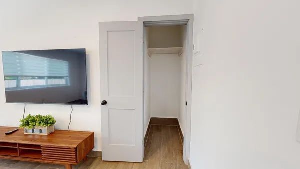 a view of table and chair in wooden floor