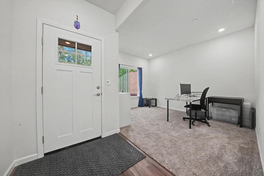 13871 Petersen Ranch Drive Pine Grove, CA 95665 - Photo 2 of 74 a workspace with furniture and a window