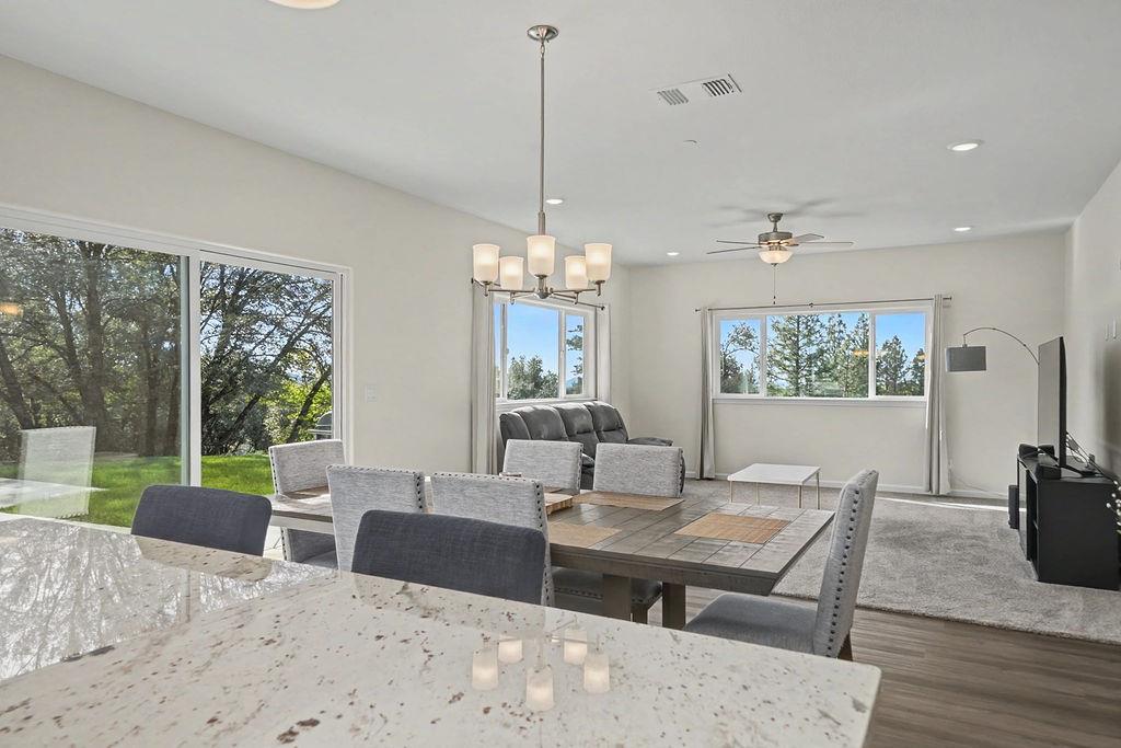 13871 Petersen Ranch Drive Pine Grove, CA 95665 - Photo 24 of 74 a view of a dining room with furniture window and outside view