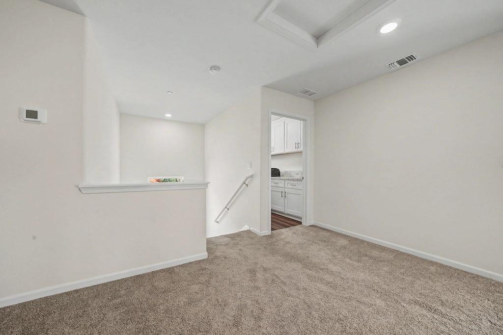 13871 Petersen Ranch Drive Pine Grove, CA 95665 - Photo 25 of 74 a view of an empty room with a kitchen