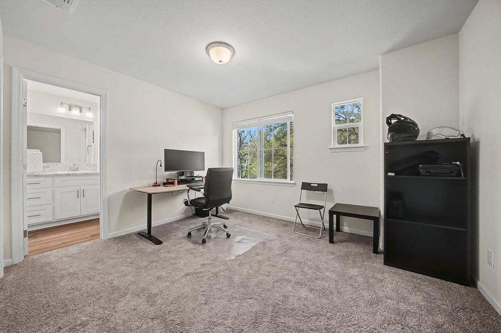 13871 Petersen Ranch Drive Pine Grove, CA 95665 - Photo 31 of 74 a view of a workspace with furniture and a window