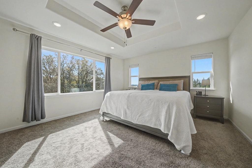 13871 Petersen Ranch Drive Pine Grove, CA 95665 - Photo 37 of 74 a bed sitting in a bedroom next to a window