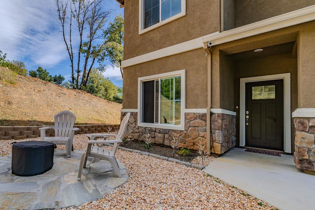 13871 Petersen Ranch Drive Pine Grove, CA 95665 - Photo 47 of 74 a view of a patio with table and chairs
