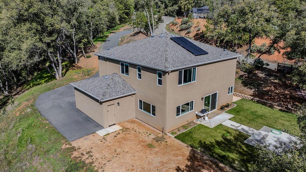 13871 Petersen Ranch Drive Pine Grove, CA 95665 - Photo 61 of 74 an aerial view of a house with a yard table and chairs