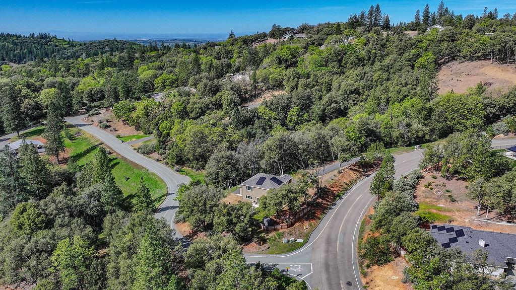13871 Petersen Ranch Drive Pine Grove, CA 95665 - Photo 66 of 74 an aerial view of a house with a yard and mountain view in back